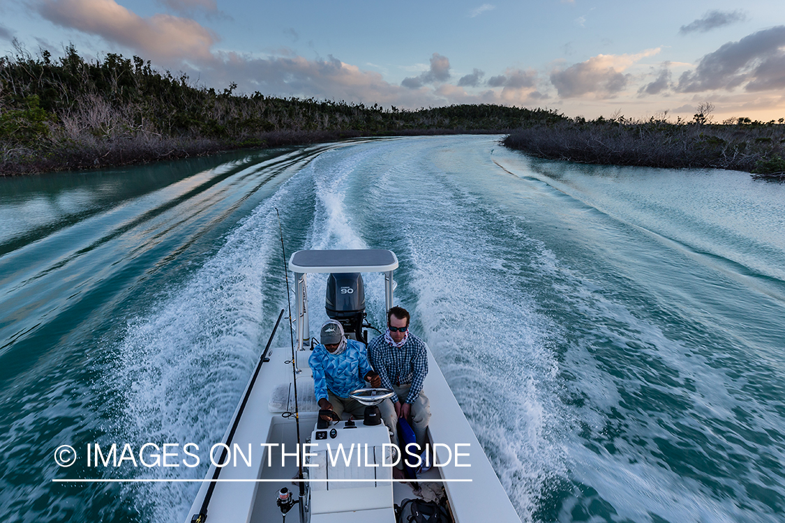 Flyfishermen on boat.