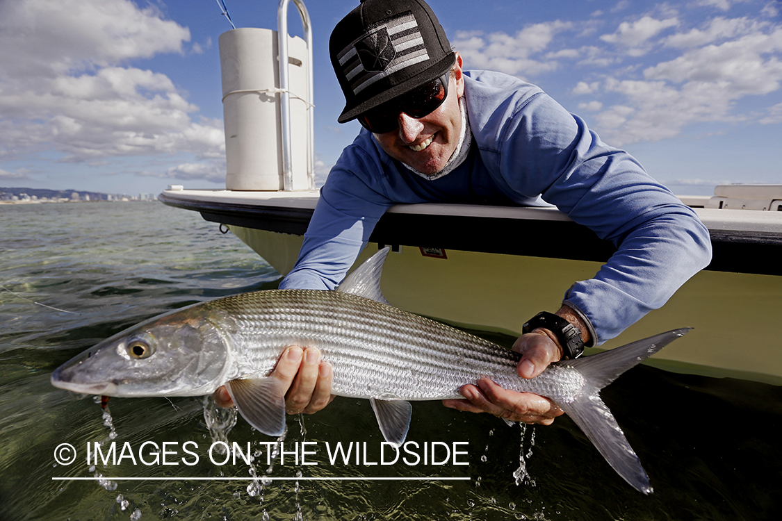 Saltwater flyfisherman with bonefish. 