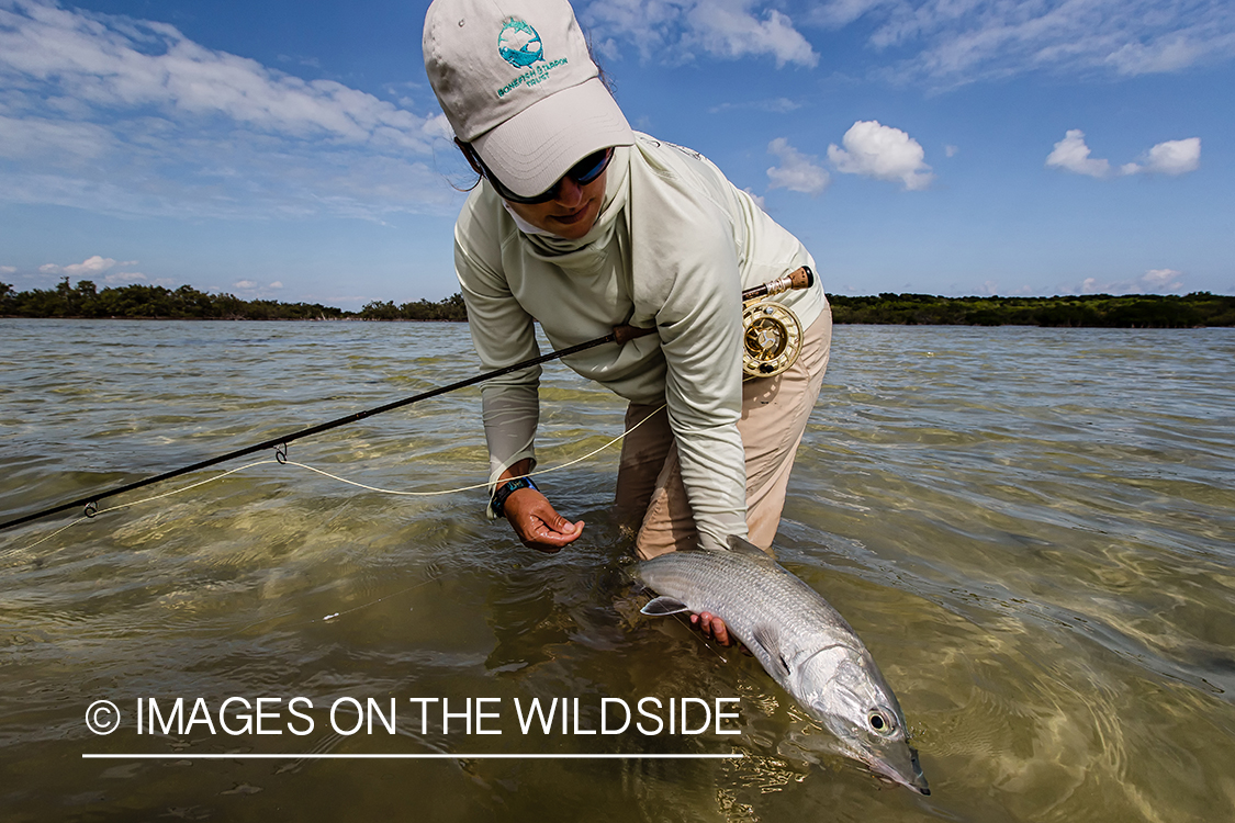 Flyfishing woman with bonefish.