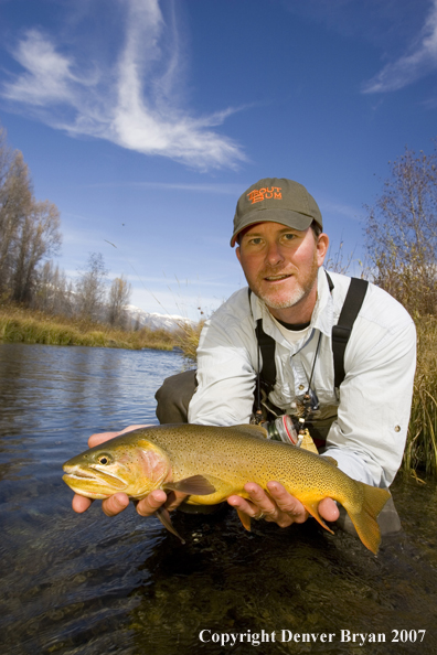 Flyfisherman with Snake River cutthroat trout.