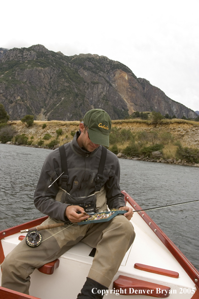 Flyfisherman choosing flies.  