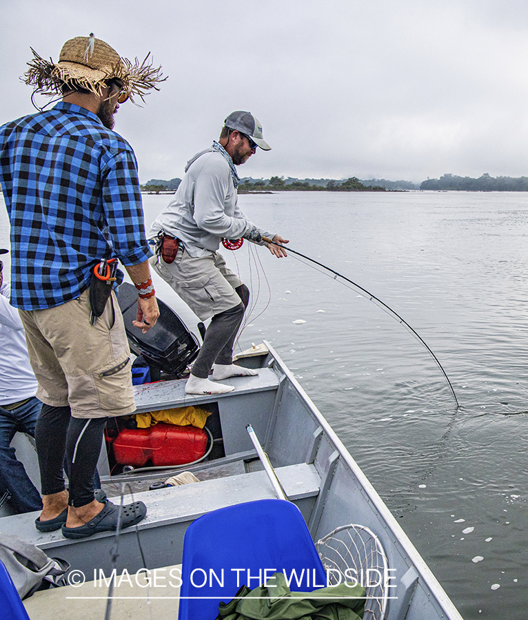 Flyfishermen on Amazon River in Venezuela.