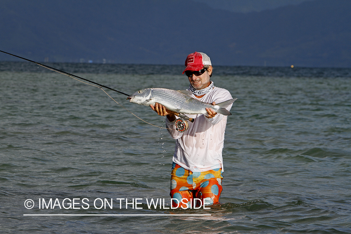 Saltwater flyfisherman with bonefish. 