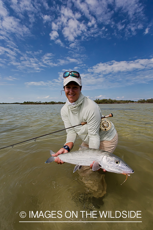 Flyfishing woman with bonefish.