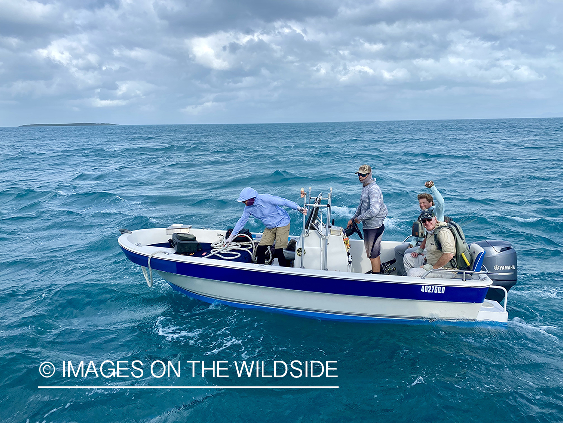 Flyfishermen leaving liveaboard to fish.