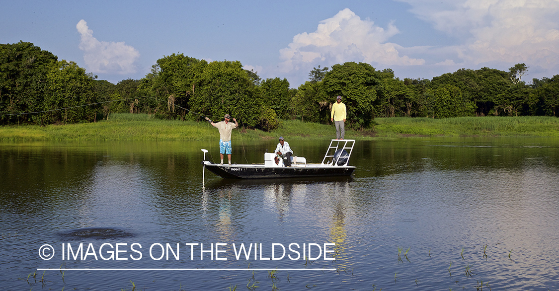 Flyfishermen on Amazon River in Venezuela.