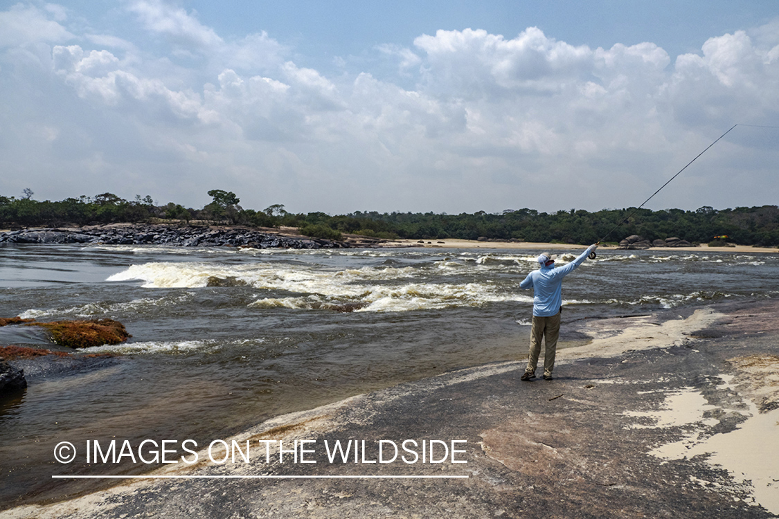 Flyfishermen on Amazon River in Venezuela.