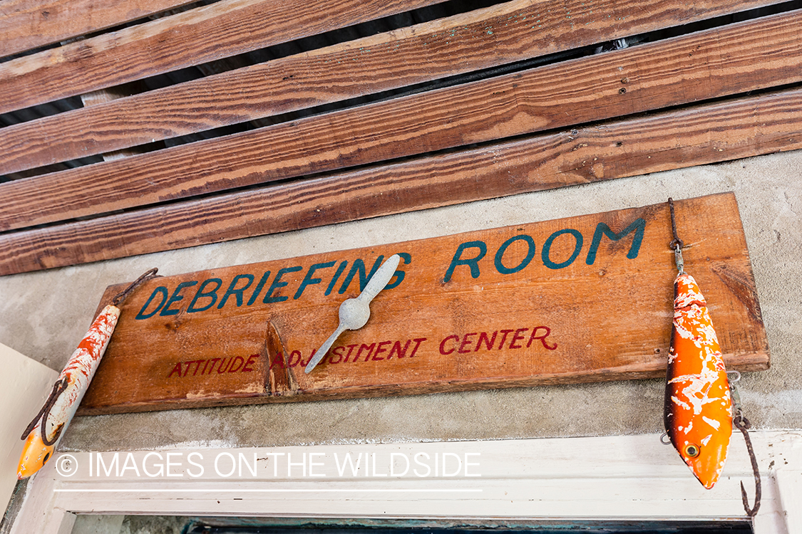 Debriefing Room sign