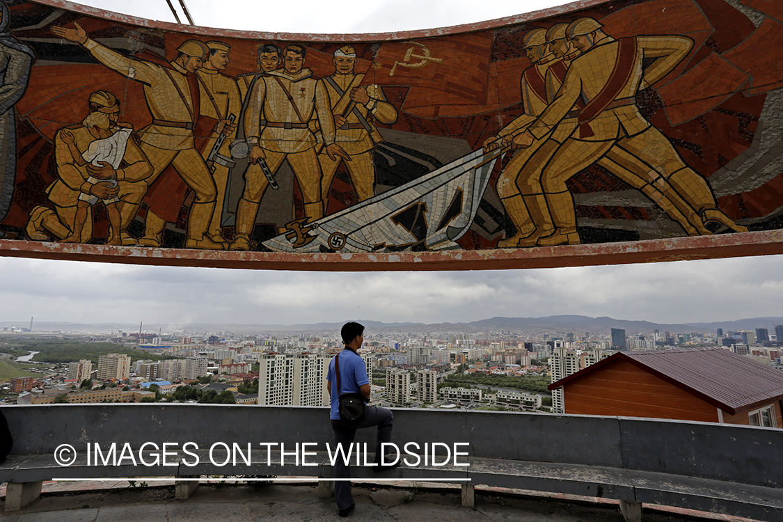 Tourist at War Memorial in Ulaanbaatar, Mongolia.