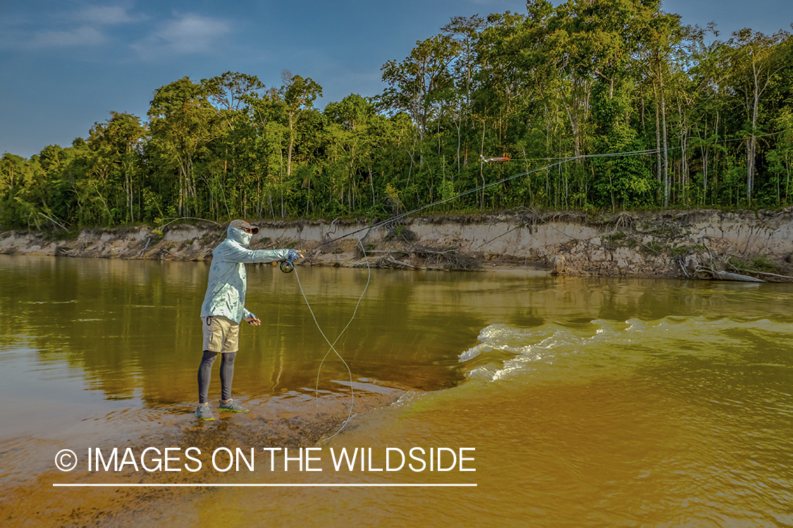 Flyfishermen on Amazon River in Venezuela.