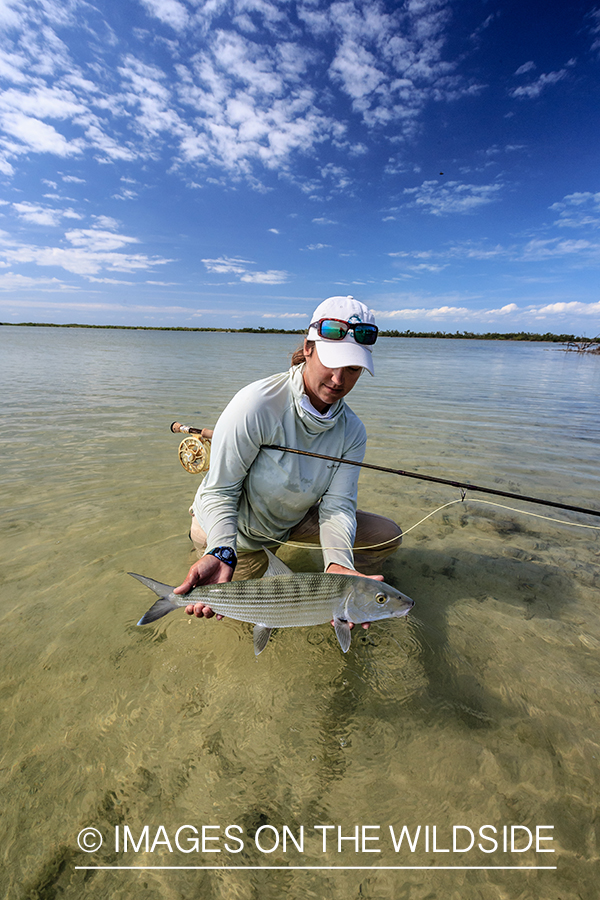 Flyfishing woman with bonefish.