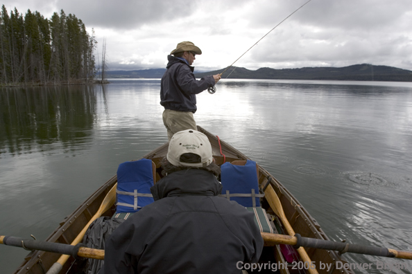 Flyfisherman fishing from driftboat.