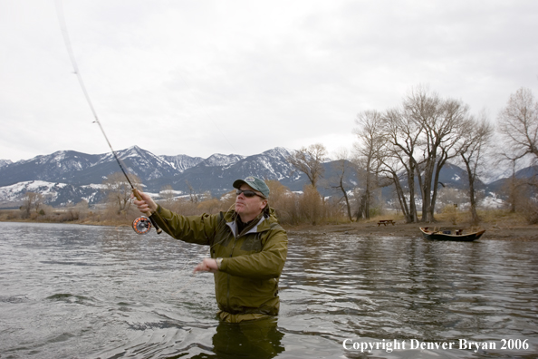 Flyfisherman in river.